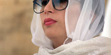 Picture taken 14 July 1990 of Pakistani Prime minister Benazir Bhutto at her arrival in Alger.