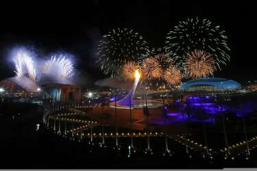 Fireworks are seen over the Olympic Park at the end of the opening ceremony of the 2014 Sochi Winter Olympics, February 7, 2014. REUTERS/Marko Djurica (RUSSIA  - Tags: OLYMPICS SPORT)