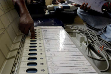 An Indian election official checks an Electronic Voting Machine (EVM) prior to distribution to polling officials at Agartala, the capital of northeastern state of Tripura on April 6, 2014. Five constituencies in Assam state and one in Tripura (Tripura West) state will go to the polls in the first phase as India's marathon nine-phase election kicks off April 7 and ends on May 12 when hundreds of millions will have cast their ballots.   AFP PHOTO/ARINDAM DEY