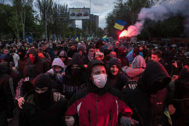 Football fans lead the peaceful pro-Ukrainian march started from the stadium Olimpiyski in Donetsk, Eastern Ukraine.