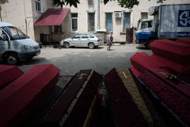 The coffins seen in a back yard of a morgue in Donetsk, prepared for the bodies of Russian citizens, which were announced to be ready to be repatriated to Russia.