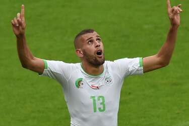 Algeria's forward Islam Slimani celebrates after scoring a goal during the Group H football match between South Korea and Algeria at the Beira-Rio Stadium in Porto Alegre during the 2014 FIFA World Cup on June 22, 2014. AFP PHOTO / PEDRO UGARTE