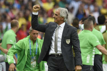 Algeria's Bosnian coach Vahid Halilhodzic celebrates after his team scored a goal during the Group H football match between South Korea and Algeria at the Beira-Rio Stadium in Porto Alegre during the 2014 FIFA World Cup on June 22, 2014.  AFP PHOTO / PHILIPPE DESMAZES