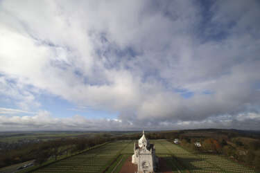 An aerial view shows the French World War One Military Cemetery at Notre Dame de Lorette memorial in Ablain-Saint-Nazaire, northern France November 5, 2014. The cemetery is the largest French military cemetery with more than 40,000 soldiers buried here. The ground was the place of a series of long and bloody battles between the French, the Allies and German armies, named as the Three Battles of Artois (September 1914- October 1915). The year 2014 marks the centennial commemoration for the soldiers who fought in the First World War (WWI).  REUTERS/Pascal Rossignol (FRANCE - Tags: MILITARY ANNIVERSARY CONFLICT)